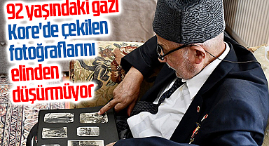 92 yaşındaki gazi Kore'de çekilen fotoğraflarını elinden düşürmüyor